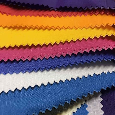 30 Denier Nylon Ripstop Fabrics 66 inches wide Assorted Colors Uncoated 59 cents a pound about 10 cents a yard.