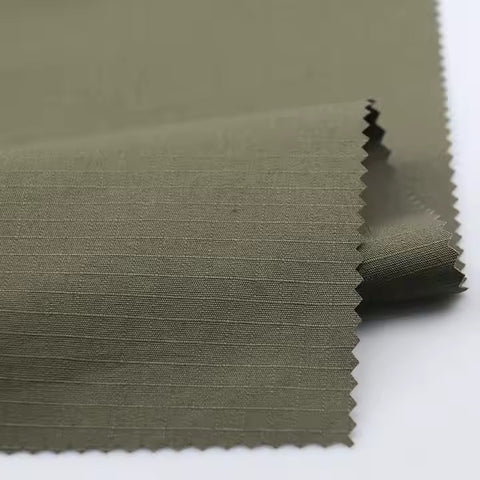 Ranger Green Nylon Ripstop Fabric Feels & looks like nylon cotton NYCO ripstop 60" $1.50 a yard