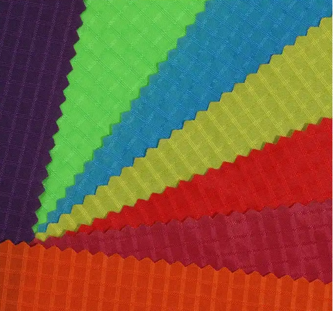 70 Denier Nylon Ripstop Fabrics Durable Water Repellent coated 60 inches wide Assorted Colors 79 cents a pound about 18 cents a yard.