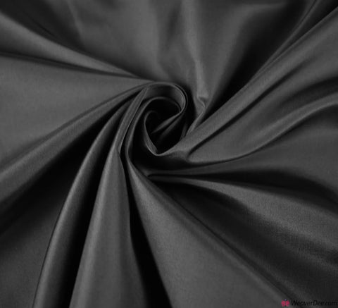 Black Nylon Taffeta Fabrics Water Repellent  60 inches wide Assorted Colors 1.25 a pound about 35 cents a yard.