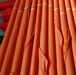 Hi-Viz High Visibility Orange 70 Denier Nylon Ripstop Fabric, 10 to 20 yard rolls. Durable Water Repellent 60" wide 99 cents a pound about 20 cents a  yard