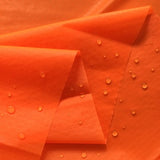 HI-Vis Bright Orange 70 Denier Nylon Ripstop  Fabric DWR  Coated,  60"   $1.25 a  yard