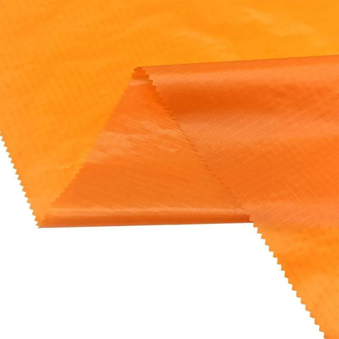 Tangerine Color Soar Coat 30 Denier Nylon Silicone Coated Silnylon Ripstop Parachute Fabric 1.1 oz. DWR, Silicon Coated, 66 inch $1.99 a yard